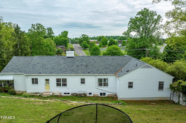 134 Parkland Dr, Bristol, VA 24201 - rear view of house featuring a lawn, a shingled roof, and entry steps