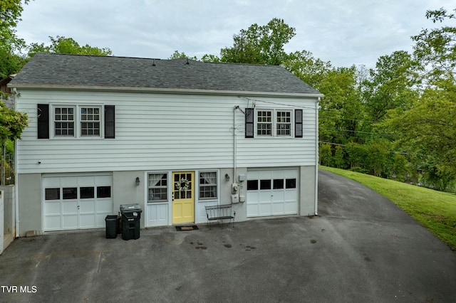 134 Parkland Dr, Bristol, VA 24201 - view of front of home with a garage, asphalt driveway, and a shingled roof