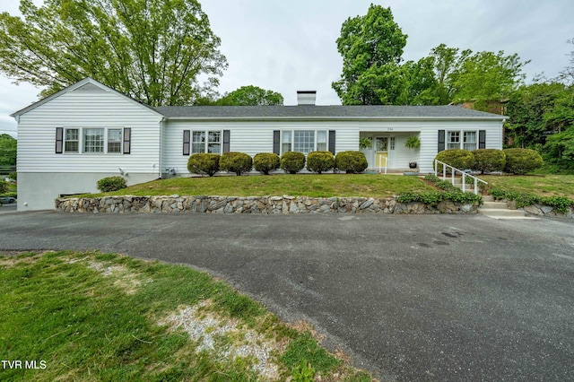 134 Parkland Dr, Bristol, VA 24201 - ranch-style home with a chimney and a front lawn