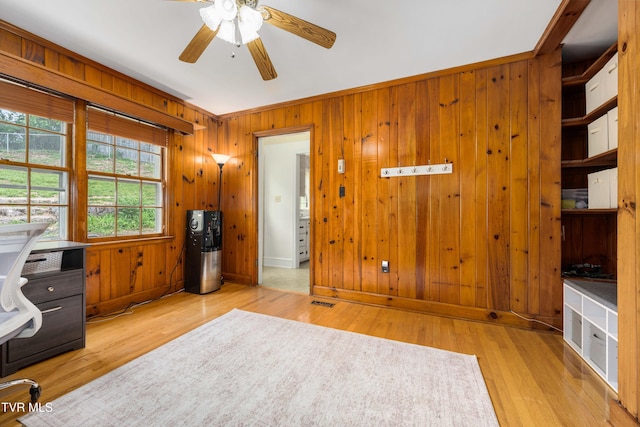 134 Parkland Dr, Bristol, VA 24201 - unfurnished office with ceiling fan, wood finished floors, wood walls, and baseboards