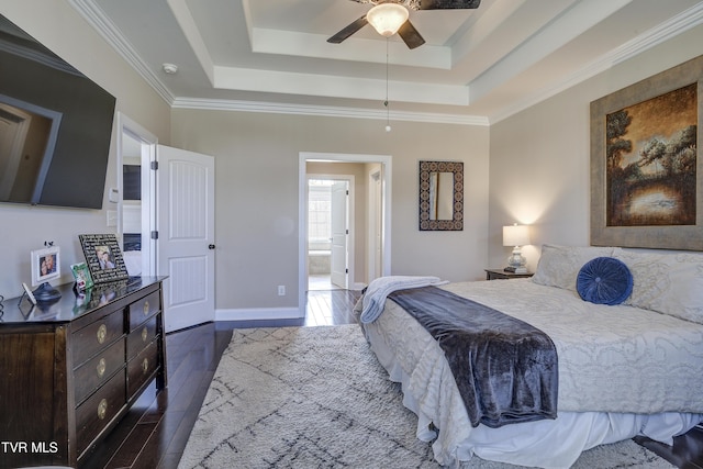 2909 Greenline Rd, Johnson City, TN 37604 - bedroom featuring a raised ceiling, dark wood-style floors, crown molding, baseboards, and ensuite bath