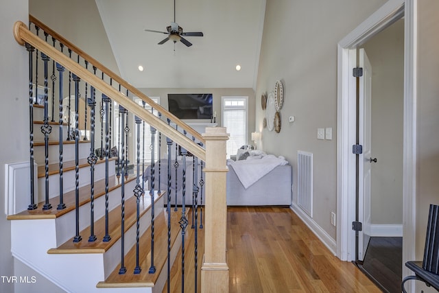 2909 Greenline Rd, Johnson City, TN 37604 - staircase featuring a ceiling fan, wood finished floors, baseboards, high vaulted ceiling, and recessed lighting