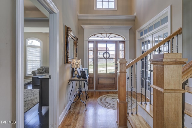 2909 Greenline Rd, Johnson City, TN 37604 - foyer with wood finished floors, stairs, a towering ceiling, and baseboards