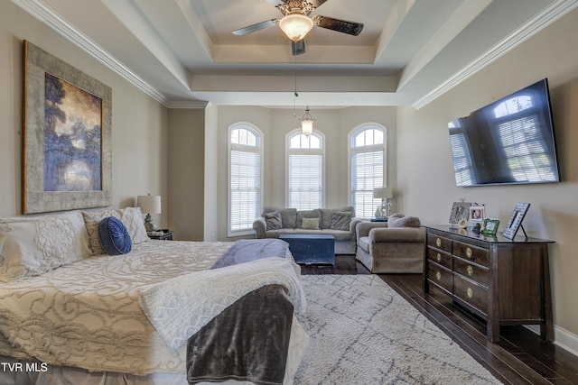 2909 Greenline Rd, Johnson City, TN 37604 - bedroom featuring a raised ceiling, dark wood-style floors, crown molding, and a ceiling fan