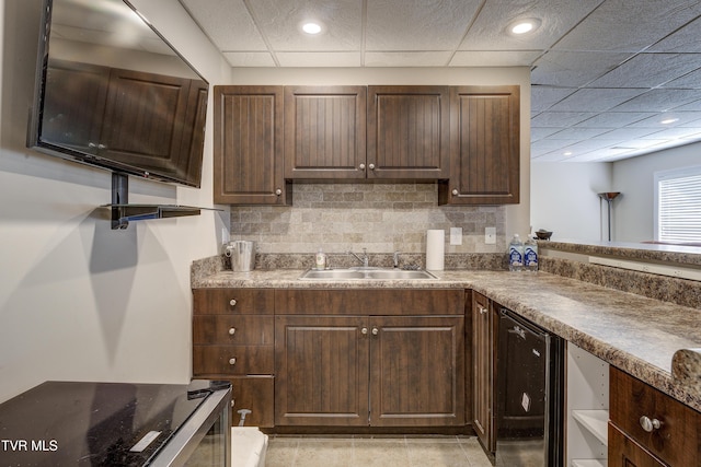 2909 Greenline Rd, Johnson City, TN 37604 - kitchen featuring wine cooler, a sink, a drop ceiling, tasteful backsplash, and dark brown cabinets