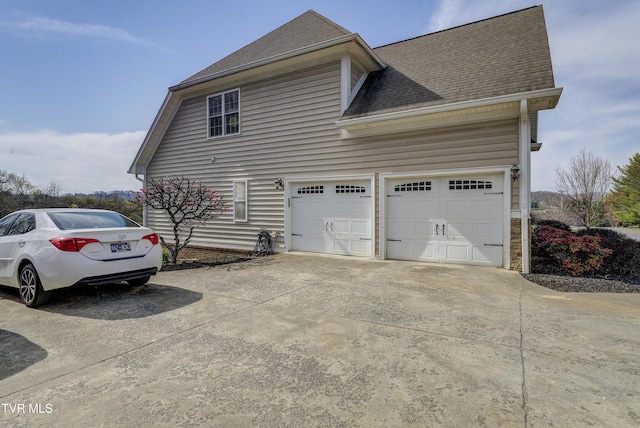 2909 Greenline Rd, Johnson City, TN 37604 - view of home's exterior with concrete driveway, a shingled roof, and an attached garage