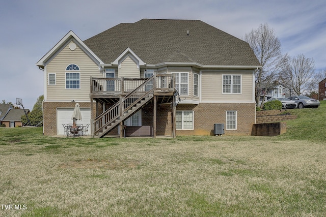 2909 Greenline Rd, Johnson City, TN 37604 - back of property featuring brick siding, central AC, a deck, stairs, and a yard