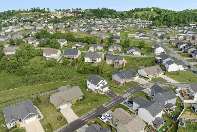 aerial view of property's location with nearby suburban area