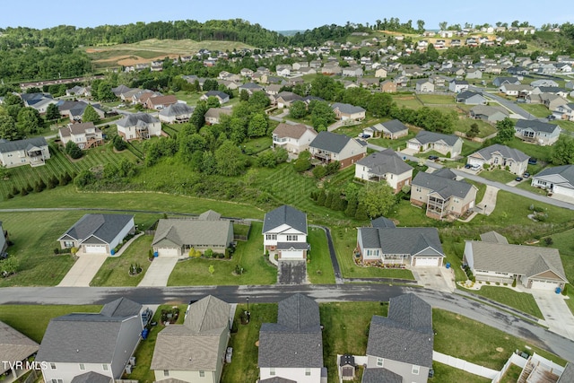 aerial overview of property's location with nearby suburban area