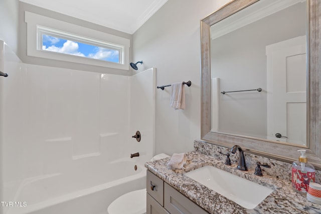 full bathroom with ornamental molding, vanity, bathing tub / shower combination, and toilet