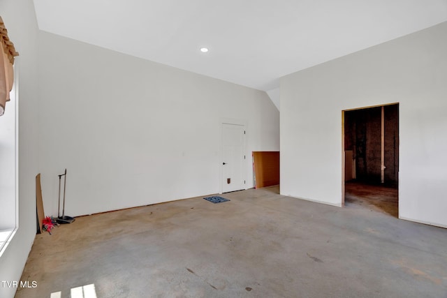unfurnished room featuring concrete floors and recessed lighting