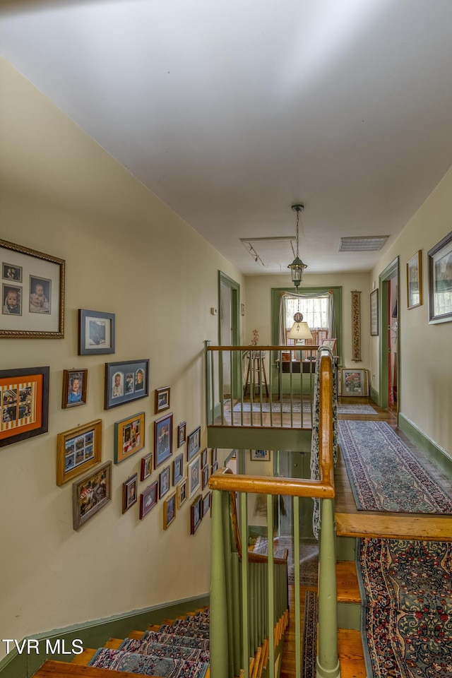 dining room with wood finished floors and baseboards