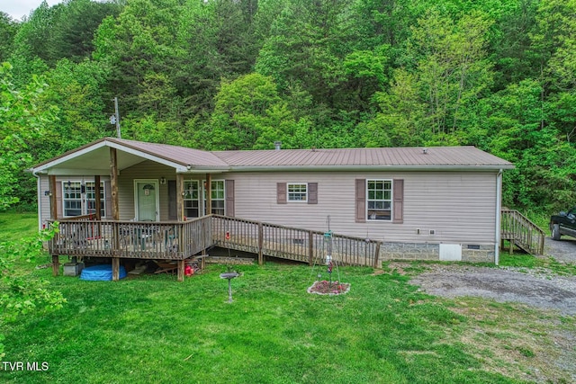 596 Devils Nose Rd, Rogersville, TN 37857 - view of front of house with crawl space, a front lawn, metal roof, a porch, and a view of trees