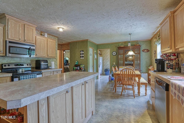 596 Devils Nose Rd, Rogersville, TN 37857 - kitchen with appliances with stainless steel finishes, light countertops, a center island, light brown cabinetry, and hanging light fixtures