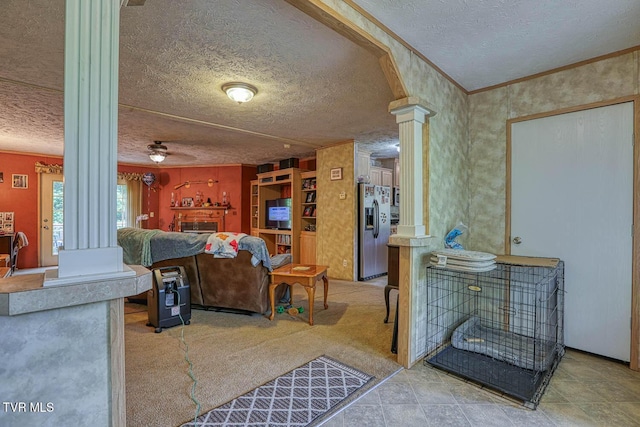 596 Devils Nose Rd, Rogersville, TN 37857 - living area with decorative columns, a textured ceiling, and ornamental molding