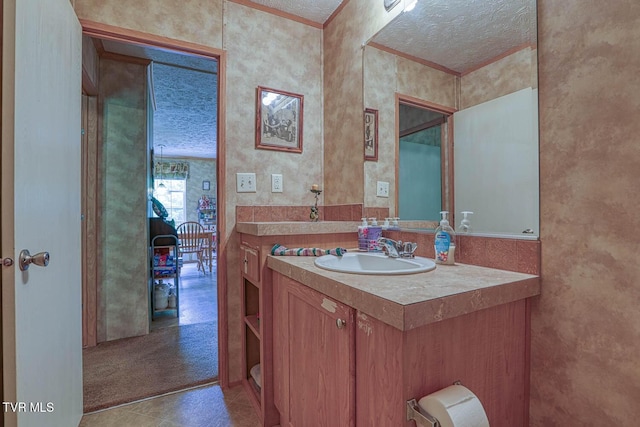 596 Devils Nose Rd, Rogersville, TN 37857 - half bathroom featuring crown molding, a textured ceiling, and vanity