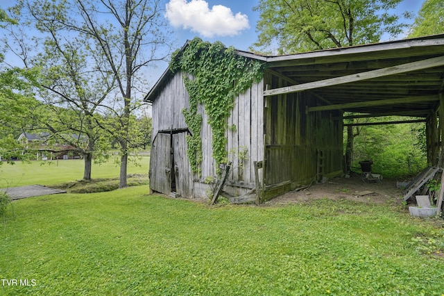 view of outbuilding featuring an outbuilding