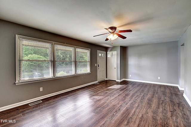 416 Ridgefields Rd, Kingsport, TN 37660 - spare room featuring ceiling fan, wood finished floors, and baseboards