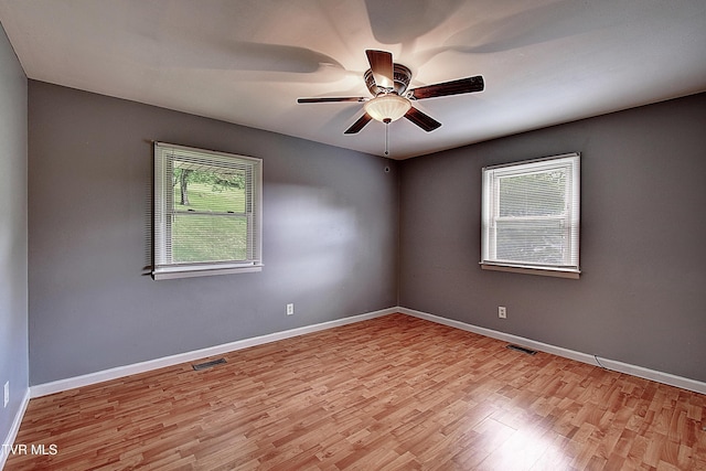 416 Ridgefields Rd, Kingsport, TN 37660 - spare room with healthy amount of natural light, wood finished floors, ceiling fan, and baseboards