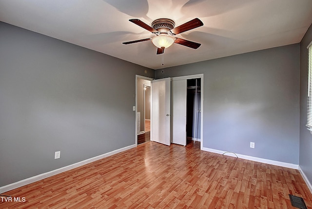416 Ridgefields Rd, Kingsport, TN 37660 - unfurnished bedroom with light wood-style floors, baseboards, a closet, and ceiling fan