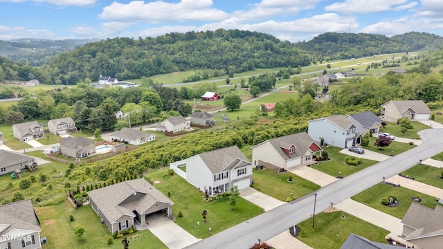 aerial view of residential area with a forest
