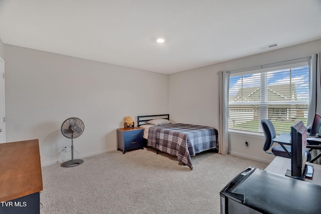 bedroom featuring carpet floors and baseboards