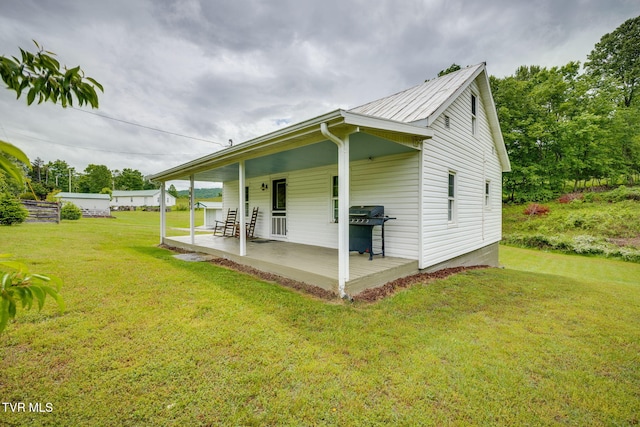 894 Mountain View Rd, Rogersville, TN 37857 - view of side of home with a yard and covered porch