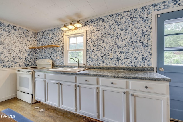 894 Mountain View Rd, Rogersville, TN 37857 - kitchen with white electric stove, wallpapered walls, light wood-style floors, dark countertops, and a sink