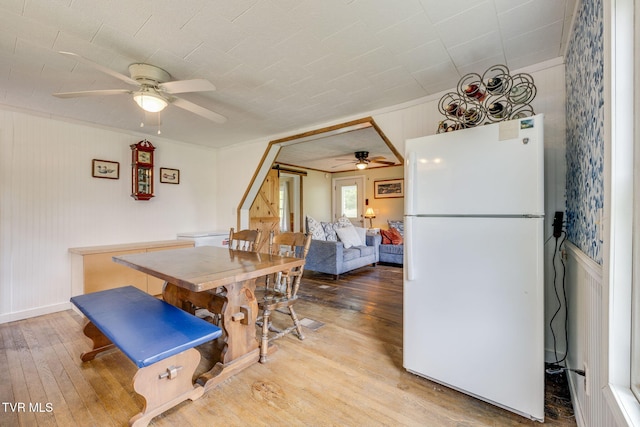 894 Mountain View Rd, Rogersville, TN 37857 - dining area with a ceiling fan, light wood-style flooring, crown molding, and baseboards