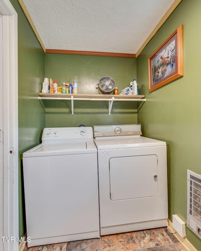 894 Mountain View Rd, Rogersville, TN 37857 - washroom featuring washing machine and clothes dryer, a textured ceiling, crown molding, and heating unit