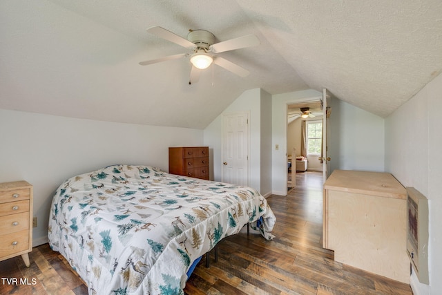 894 Mountain View Rd, Rogersville, TN 37857 - bedroom with dark wood-style floors, vaulted ceiling, a textured ceiling, a ceiling fan, and heating unit