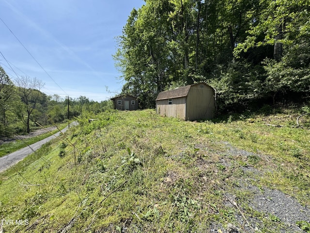 201 Andover Dr, Bristol, VA 24201 - view of yard featuring a storage shed and an outdoor structure