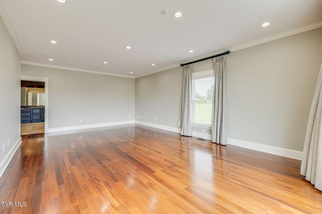 20484 Lake Rd, Abingdon, VA 24211 - spare room featuring wood finished floors, ornamental molding, baseboards, and recessed lighting