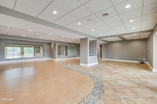 20484 Lake Rd, Abingdon, VA 24211 - basement featuring a drop ceiling, baseboards, recessed lighting, and light tile patterned floors