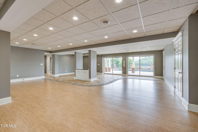20484 Lake Rd, Abingdon, VA 24211 - unfurnished living room featuring light wood-style flooring, a drop ceiling, baseboards, and recessed lighting