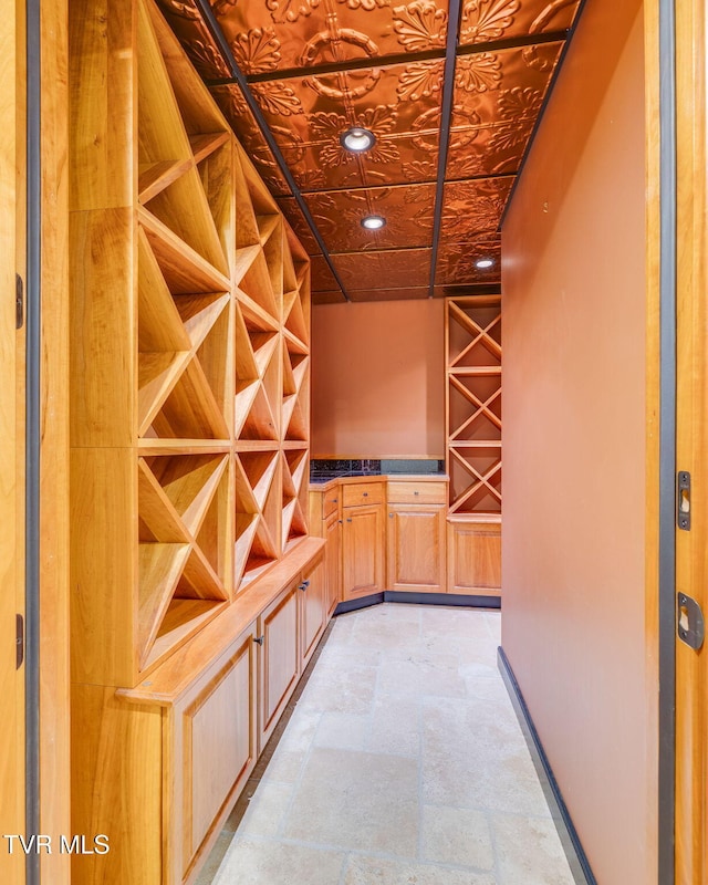 20484 Lake Rd, Abingdon, VA 24211 - wine cellar featuring an ornate ceiling and light stone finish flooring