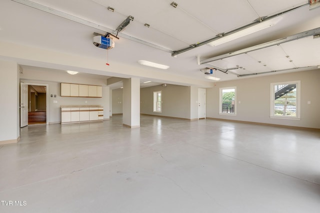 20484 Lake Rd, Abingdon, VA 24211 - garage featuring a garage door opener and baseboards