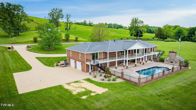 20484 Lake Rd, Abingdon, VA 24211 - rear view of property with stairway, concrete driveway, an attached garage, and brick siding