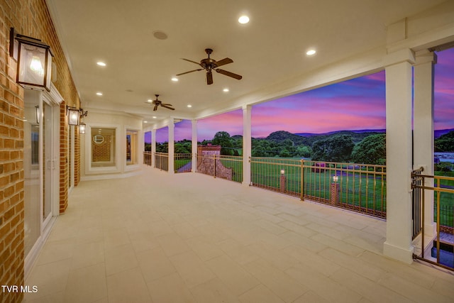20484 Lake Rd, Abingdon, VA 24211 - patio terrace at dusk featuring ceiling fan and a mountain view