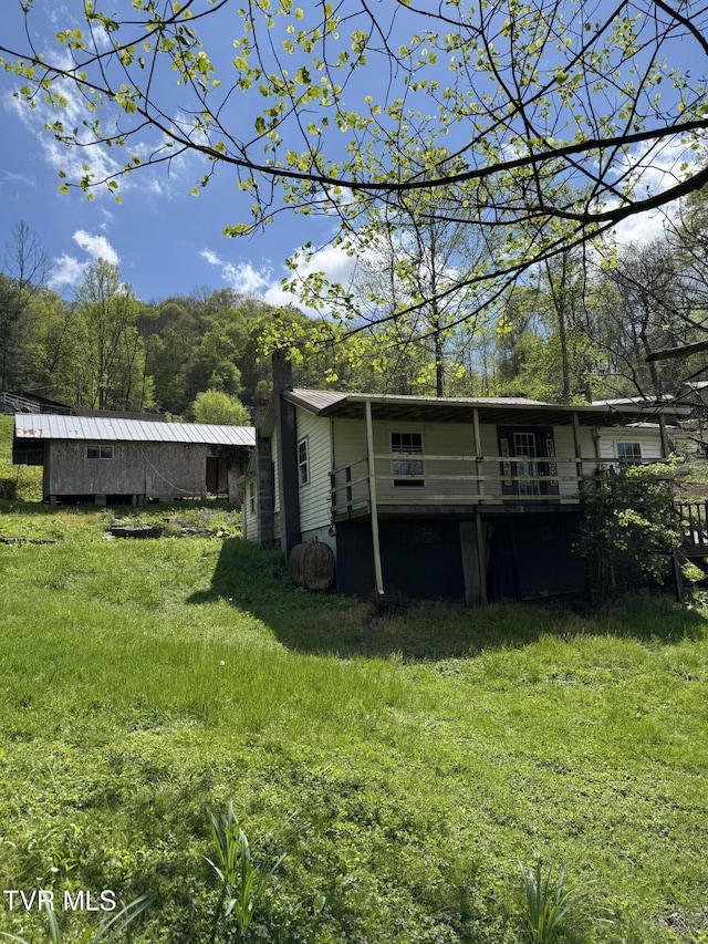 11590 Cedar Rd, Pound, VA 24279 - back of property featuring a chimney and a lawn