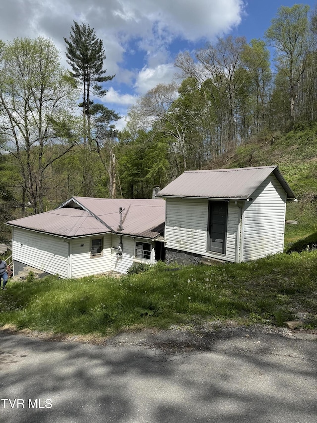 11590 Cedar Rd, Pound, VA 24279 - view of property exterior with metal roof