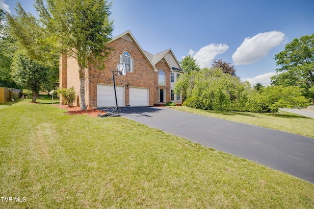 3502 Bondwood Cir, Johnson City, TN 37604 - view of front of property with asphalt driveway, an attached garage, brick siding, and a front lawn