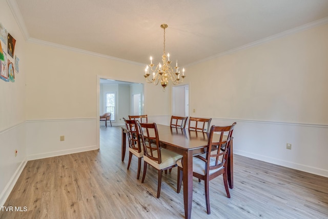 3502 Bondwood Cir, Johnson City, TN 37604 - dining area featuring a chandelier, light wood-type flooring, ornamental molding, and baseboards
