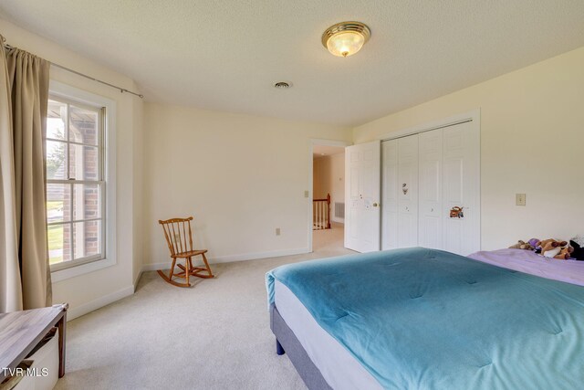 3502 Bondwood Cir, Johnson City, TN 37604 - bedroom featuring light colored carpet, baseboards, and a closet