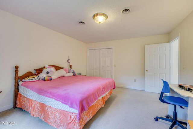 3502 Bondwood Cir, Johnson City, TN 37604 - bedroom featuring light colored carpet, a closet, baseboards, and an office area