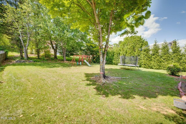 3502 Bondwood Cir, Johnson City, TN 37604 - view of yard featuring a trampoline and a playground