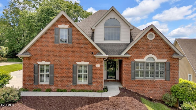 5 Fox Run Ln, Johnson City, TN 37604 - traditional-style house featuring a shingled roof and brick siding
