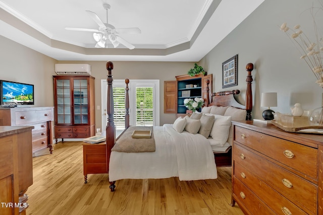 5 Fox Run Ln, Johnson City, TN 37604 - bedroom featuring a wall mounted air conditioner, a raised ceiling, light wood finished floors, ornamental molding, and access to exterior