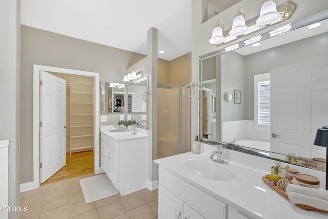 5 Fox Run Ln, Johnson City, TN 37604 - full bath featuring tile patterned floors, a shower stall, vanity, and a garden tub