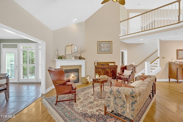 5 Fox Run Ln, Johnson City, TN 37604 - living area featuring high vaulted ceiling, baseboards, stairway, a fireplace, and a ceiling fan
